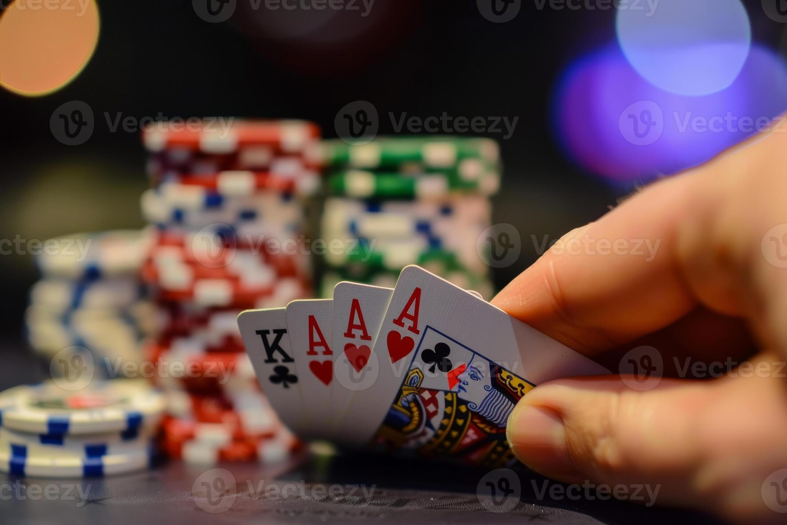 Casino chips and playing cards arranged on a poker table representing ECLBET business bonuses commissions and rewards in Malaysia